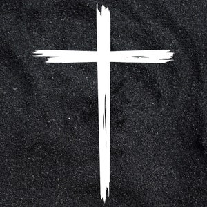 May include: A white cross painted on a black background.