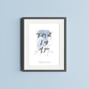 May include: A framed print with a blue watercolor background and the text "Close your eyes and let music set you free. That's all I ask of you."  The text is in black and the words "Phantom of the Opera" are printed below the text.