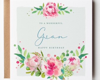 May include: A square greeting card with a brown envelope featuring a watercolor floral design in shades of pink and green. The text reads TO A WONDERFUL Gran HAPPY BIRTHDAY in a mix of script and sans-serif fonts centered on a light gray background.