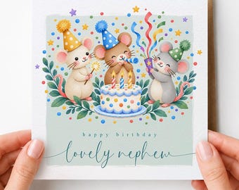 May include: A square greeting card featuring three cartoon mice wearing party hats around a birthday cake with candles. The illustration includes colorful confetti and stars. The text reads "happy birthday" and "lovely nephew" in script font.