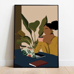 May include: A woman sits at a desk with a laptop, a book, and a cup of coffee. She is wearing a yellow sweater and has dark hair. The background is a muted brown and green with a large plant.