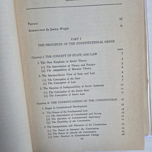 May include: Open book displaying a detailed table of contents. The title "Contents" is at the top, followed by "Preface" and "Introduction by Quincy Wright." The text outlines chapters on constitutional principles and Soviet theory.