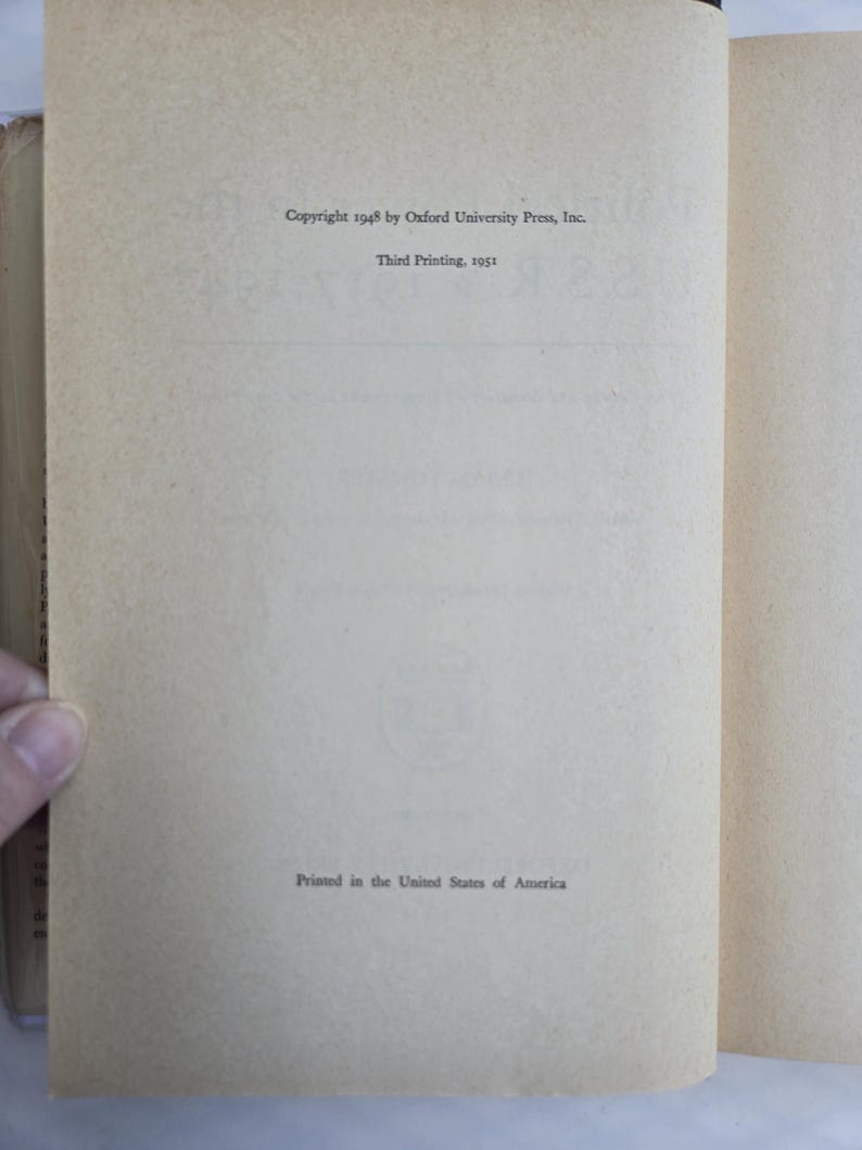 May include: Open book pages with text. The left page shows the copyright information from 1948 by Oxford University Press, Inc. and the third printing in 1951. The right page is blank. The bottom of the left page reads "Printed in the United States of America."