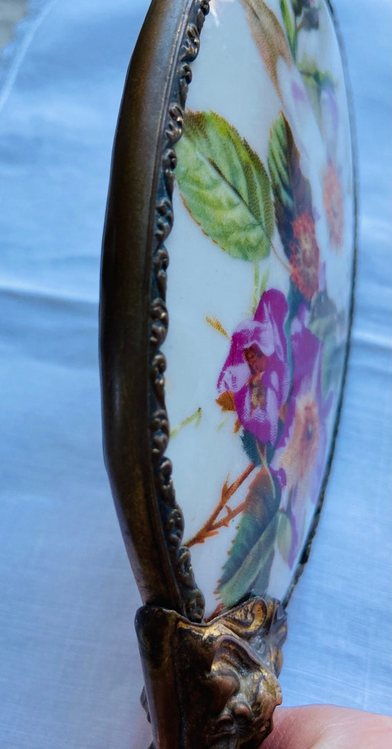 Antique hand mirror and brush set Gem