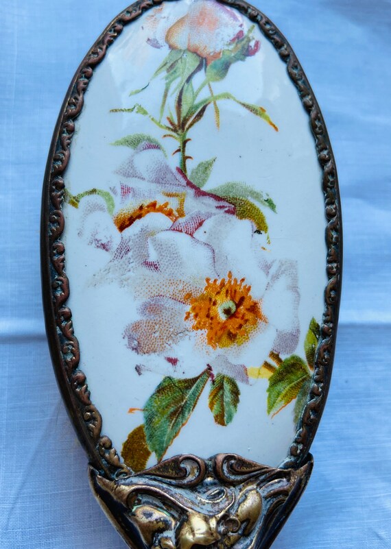 Antique hand mirror and brush set Gem