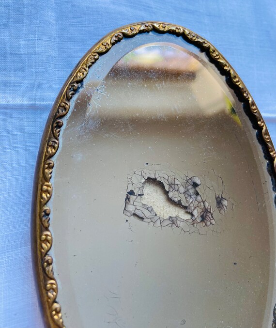 Antique hand mirror and brush set Gem