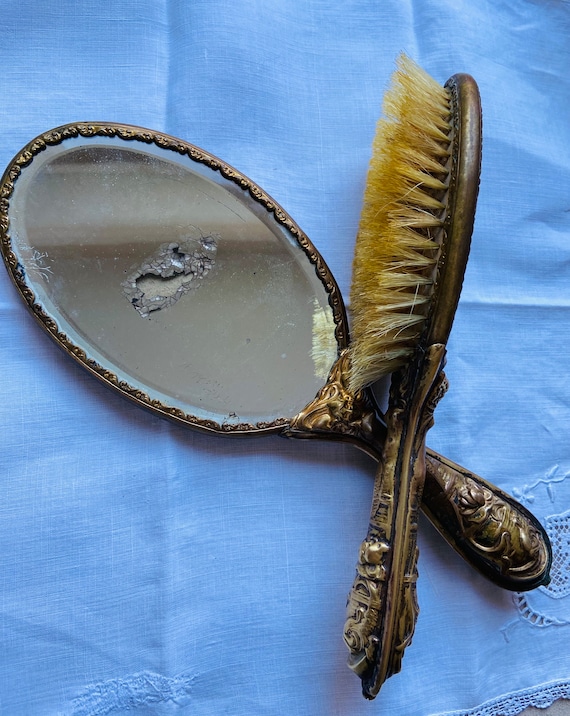 Antique hand mirror and brush set Gem