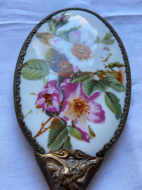 Antique hand mirror and brush set Gem