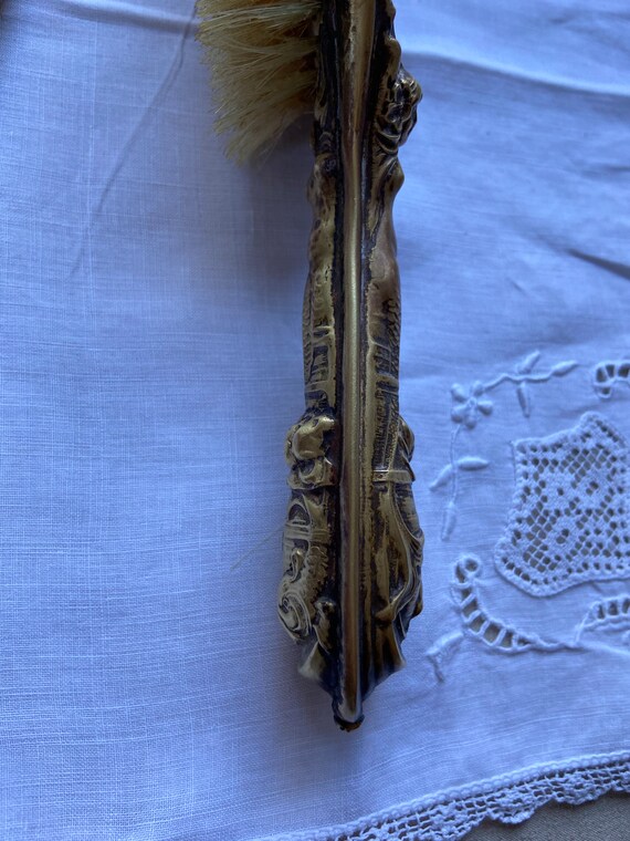 Antique hand mirror and brush set Gem