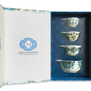 Each gift box set of nested ceramic measuring cups is beautifully decorated with unique patterns and tied with a fabric ribbon. No need for adding more gift wrap.