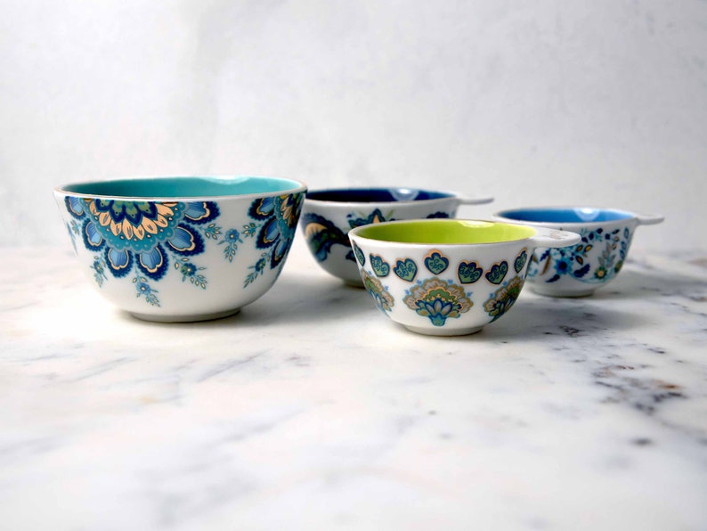 Mary DiSomma's designer nested measuring cup gift set measures liquids and solids accurately and doubles as a beautiful set of kitchen serving bowls.
