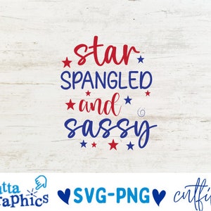 May include: A patriotic design with the words "star spangled and sassy" in red and blue script, accented with star shapes. The design is set against a white wood-grain background.