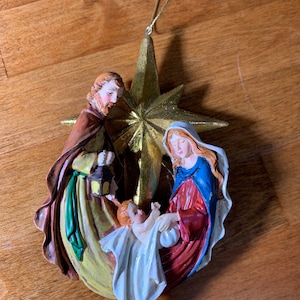 Christmas Nativity Ornament- Hand Painted Ornament with Joseph and Mary Holding Baby Jesus with Star in Excellent Condition!