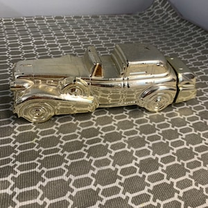 Cadillac Avon Bottle- Vintage “Solid Gold” Cadillac Excalibur After Shave Avon Bottle in Good Condition!