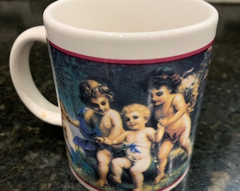 Taza de cerámica vintage con angelitos. ¡Nueva en su caja original!