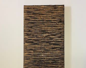 May include: A rectangular wooden wall art piece with a textured surface. The artwork features a pattern of horizontal lines in shades of brown and black, creating a natural, rustic aesthetic. The piece is displayed against a white background.