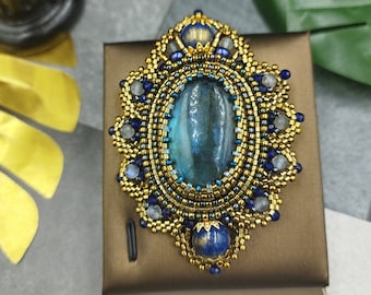 Large Labradorite Stone Brooch adorned with Gold-tone Beads. 7.5-5.5 cm