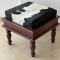 Beautiful Black And White Cowhide Ottoman Stool product logo