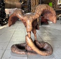 Regal Eagle, WOOD EAGLE STATUE, Dark Wood Birds, Carved Wood Art, Hand Carved Wood Statue Eagle Fighting with A Snake, Housewarming Gift product logo