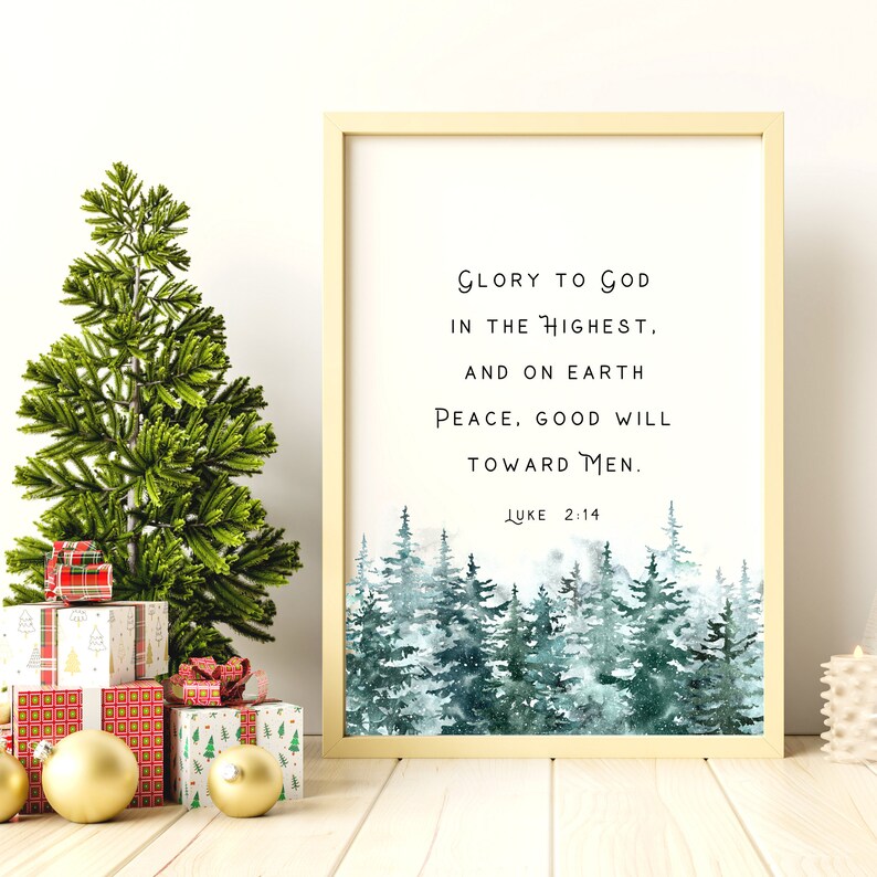 Peut inclure: Une impression encadr&eacute;e avec une peinture &agrave; l'aquarelle d'une for&ecirc;t enneig&eacute;e. L'impression pr&eacute;sente le texte "Gloire &agrave; Dieu au plus haut. Et sur la terre paix, bonne volont&eacute; envers les hommes. Luc 2:14"