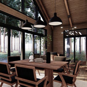 May include: Interior view of a modern dining room with large windows overlooking a forest. The room features a wooden dining table with chairs, pendant lights, and a fireplace. The walls and ceiling are made of wood.