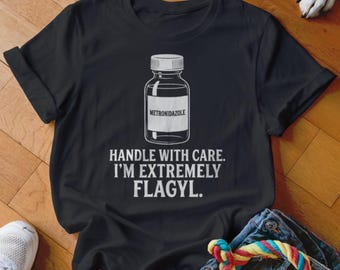 Funny Vet Shirt, Metronidazole Flagyl Pun T-Shirt, Funny Medical Humor Tee, Handle With Care Sarcastic Gift, Pharmacist Doctor Nurse T-Shirt