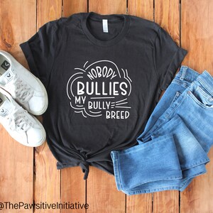 Nadie intimida mi camiseta unisex de manga corta Bully Breed - Bulldogs - Pitbulls - Entrenamiento de perros sin fuerza - Entrenador de perros sin miedo