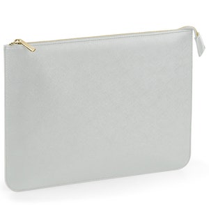 May include: A silver zippered pouch with a gold zipper pull.