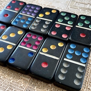 Vintage black and multi color dominos, lot of 10.
