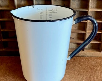 Vintage enamel measuring cup, 7”