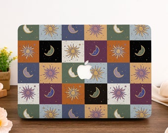 May include: A laptop skin with a checkered pattern featuring a repeating design of suns and moons in various colors. The background is a mix of green, blue, purple, orange, and black.