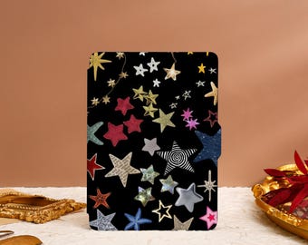 May include: A black case with a colorful star pattern. The stars are made of different materials, including glitter, paper, and fabric. The case is perfect for storing small items, such as jewelry or electronics.
