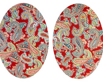 Könnte beinhalten: Zwei rote, ovale Stoffuntersetzer mit einem Paisley-Muster in Blau-, Grün- und Weißtönen.