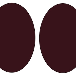 May include: Two dark brown oval-shaped objects, side by side.