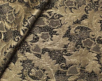 Tissu jacquard laminé double face doré et noir, largeur 140 cm