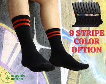 6 pares de calcetines deportivos negros de algodón orgánico hasta la rodilla.