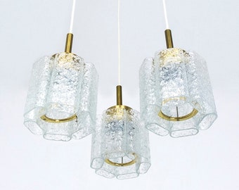Beautiful Cascade lamp ice glass and brass pendant lamp from Doria, Germany from the 1960s.