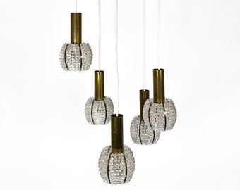 Beautiful Cascade lamp acrylic brass pendant lamp from Emil Stejnar for Rupert Nikoll from the 1950s.