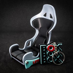 Support de téléphone + porte clé F1