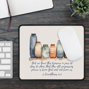 May include: A watercolour illustration of jars of clay with the quote "But we have this treasure in jars of clay to show that this all-surpassing power is from God and not from us. 2 Corinthians 4:7" printed below.