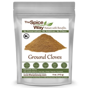 May include: A silver resealable pouch of ground cloves, labeled "The Spice Way Ground Cloves". The pouch is 4 ounces (112 grams) and features a green logo with the text "The Spice Way Nature with Benefits." The pouch also includes a Kosher, Vegan, MSG Free, and Non-GMO certification.