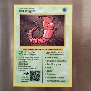 May include: A yellow and green illustrated card with a red worm cartoon. The card is titled "Composting Worm Red Wiggler" and lists the worm's strengths and weaknesses for composting.