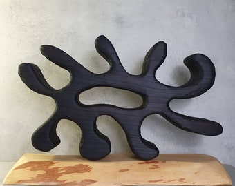 Burnt wood table sculpture with yakisugi technique and wabi-sabi philosophy by sculptor Dean Marino