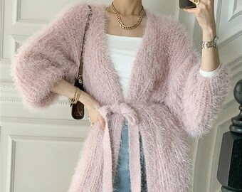 fuzzy pink cardigan sweater