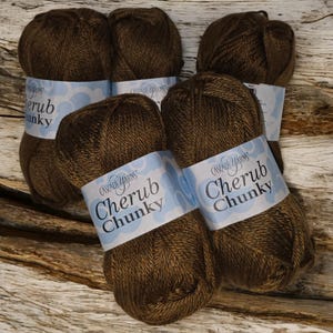 May include: Five skeins of brown Cascade Yarns Cherub Chunky yarn.