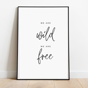 May include: Black and white printable wall art with the text "We are wild, We are free".