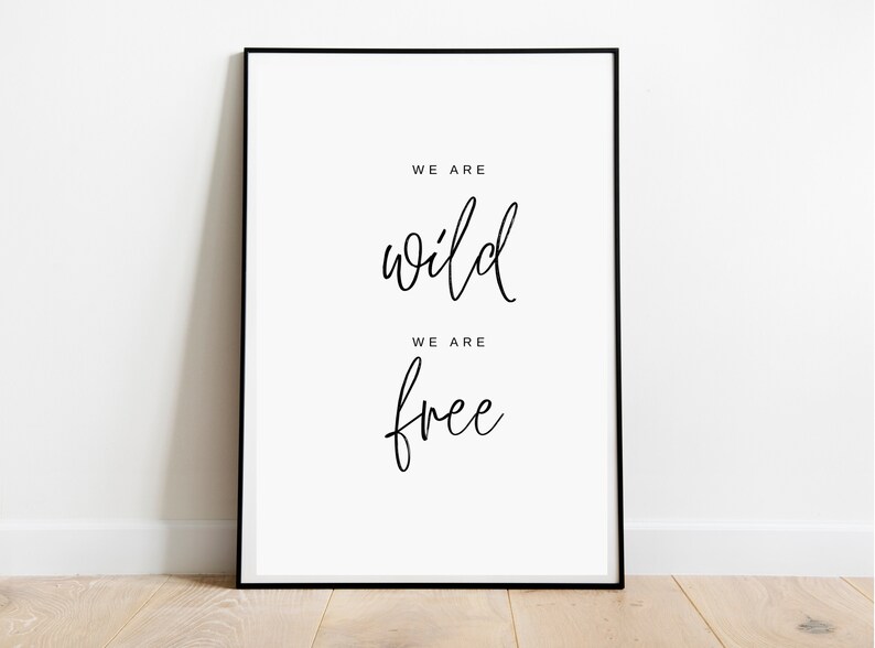 May include: Black and white printable wall art with the text "We are wild, We are free".