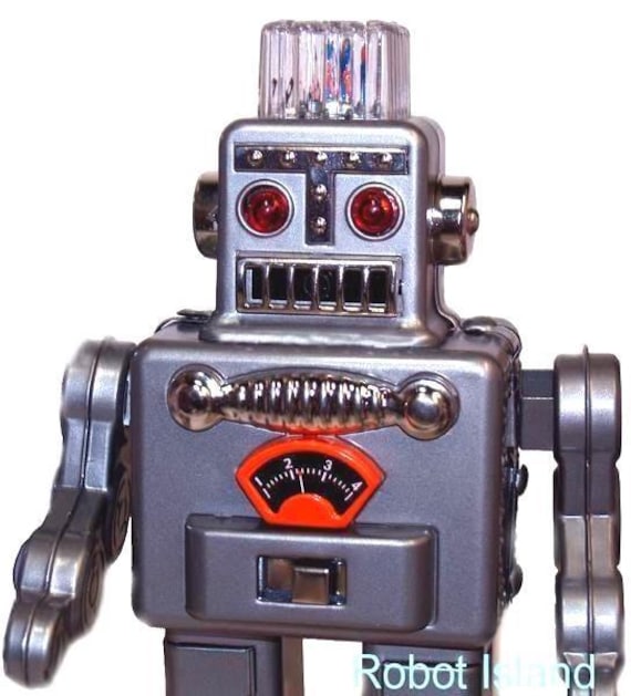 喫煙する宇宙飛行士ロボットのブリキのおもちゃ（電池式） - Etsy 日本