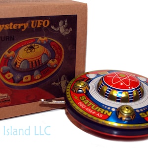 Flying Saucer UFO Saturn Tin Toy Windup