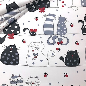 Tela de algodón - Gatos en una línea blanca